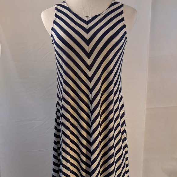 white sleeveless swing dress